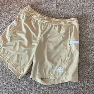 Gold women’s adidas shorts